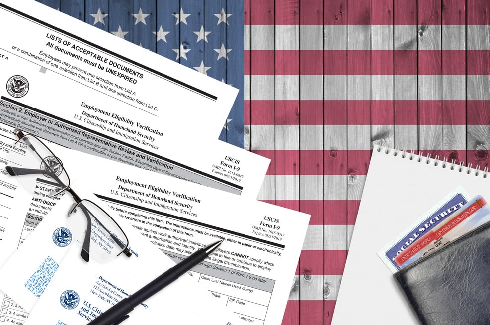 USCIS Form I-9 Employment Eligibility Verification Lies on Office Table